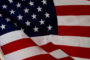 Closeup with flags behind